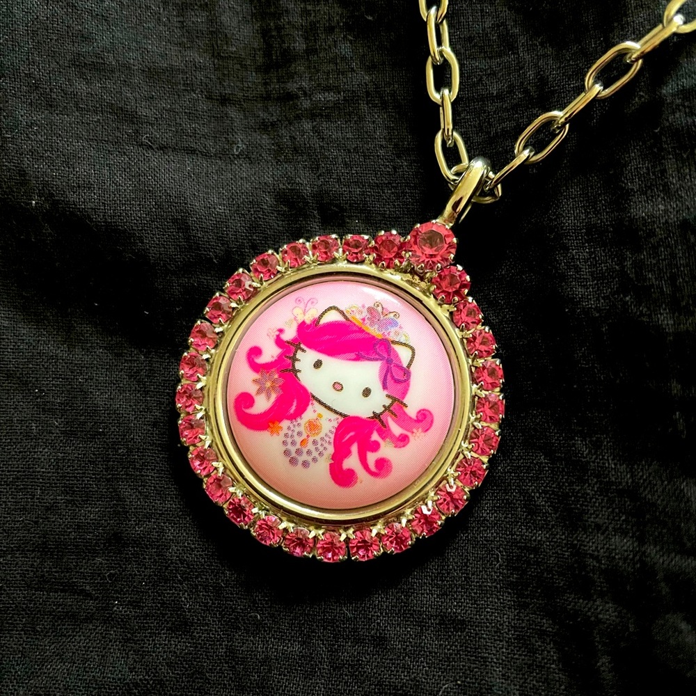 Hello Kitty pink head necklace by Tarina Tarantino